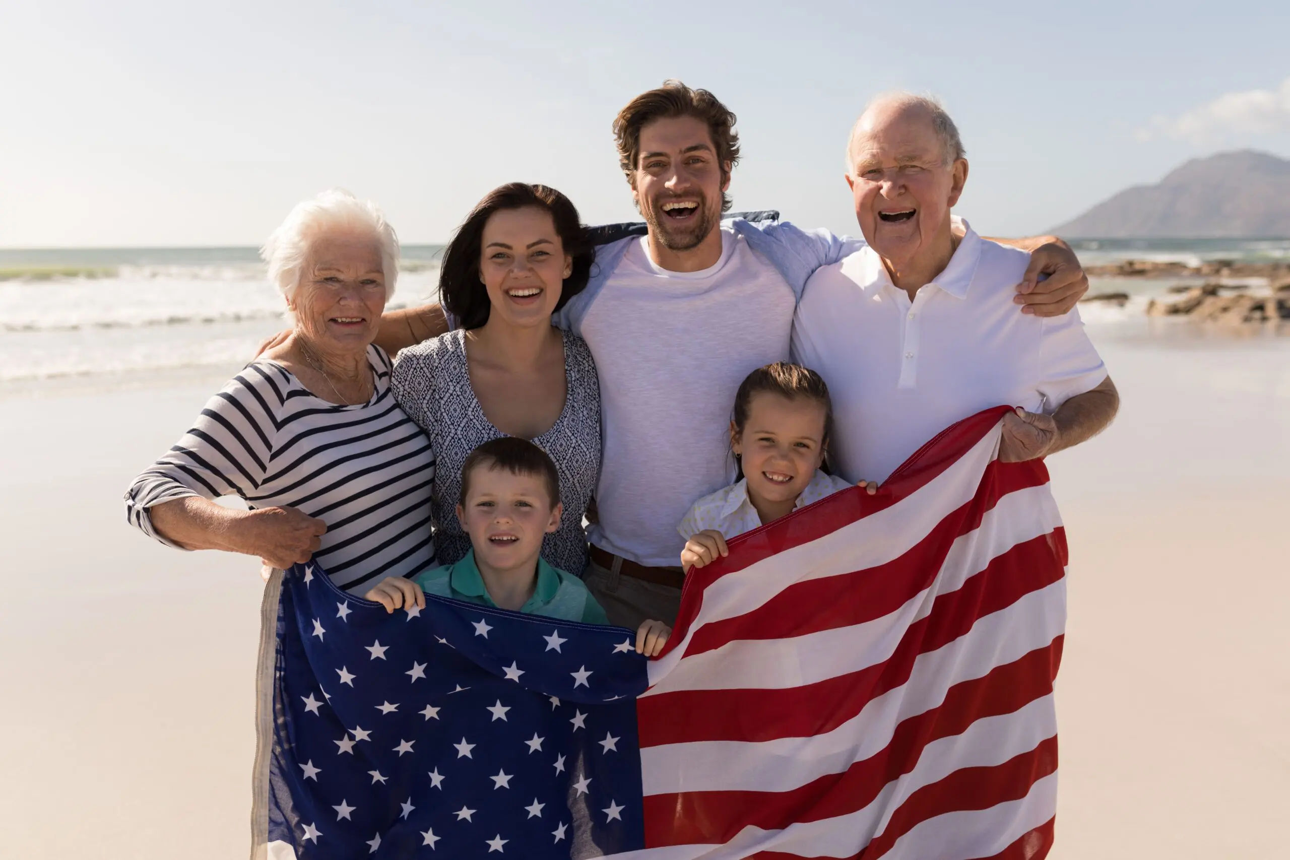 American family with US flag preparing to move to France with visitor visa